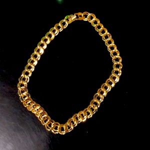 Gold tone necklace.